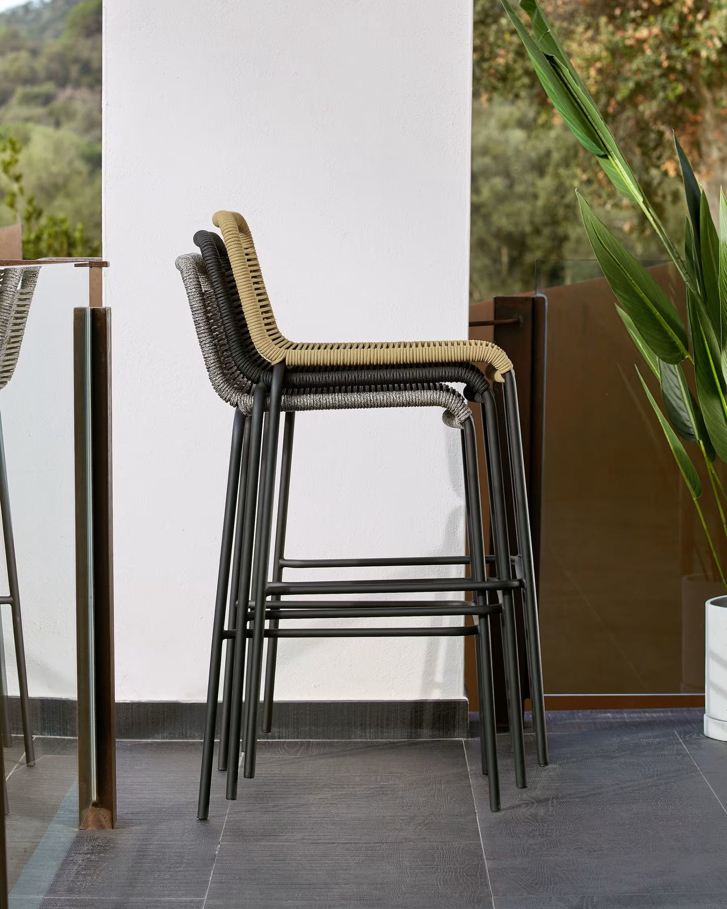 Kave Home Lambton stackable stool in black rope and black finish steel, 74 cm