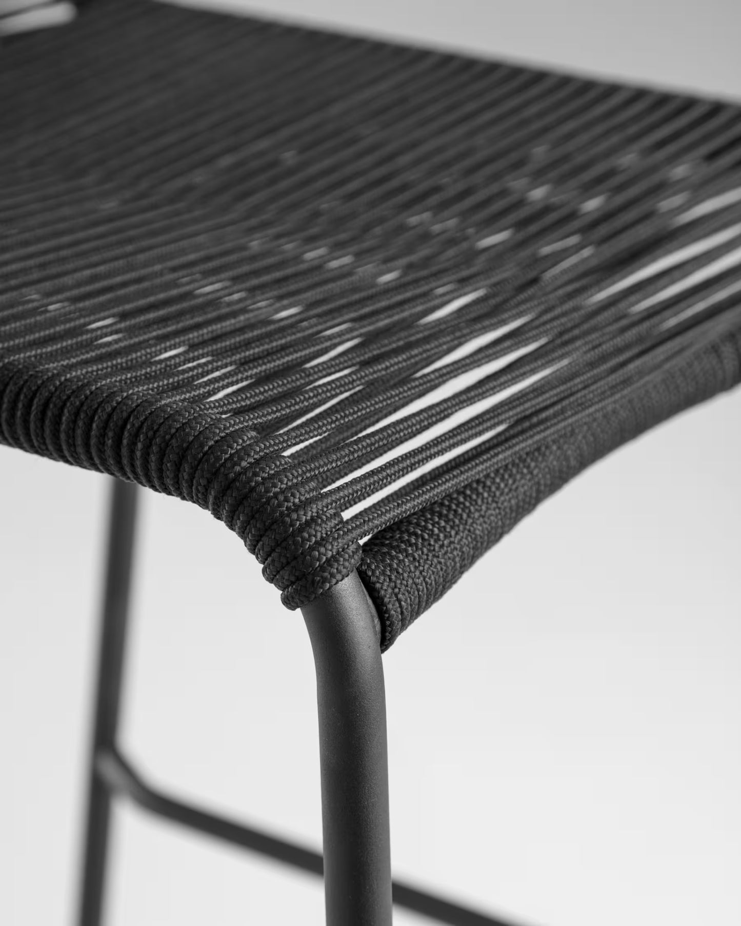 Kave Home Lambton stackable stool in black rope and black finish steel, 74 cm